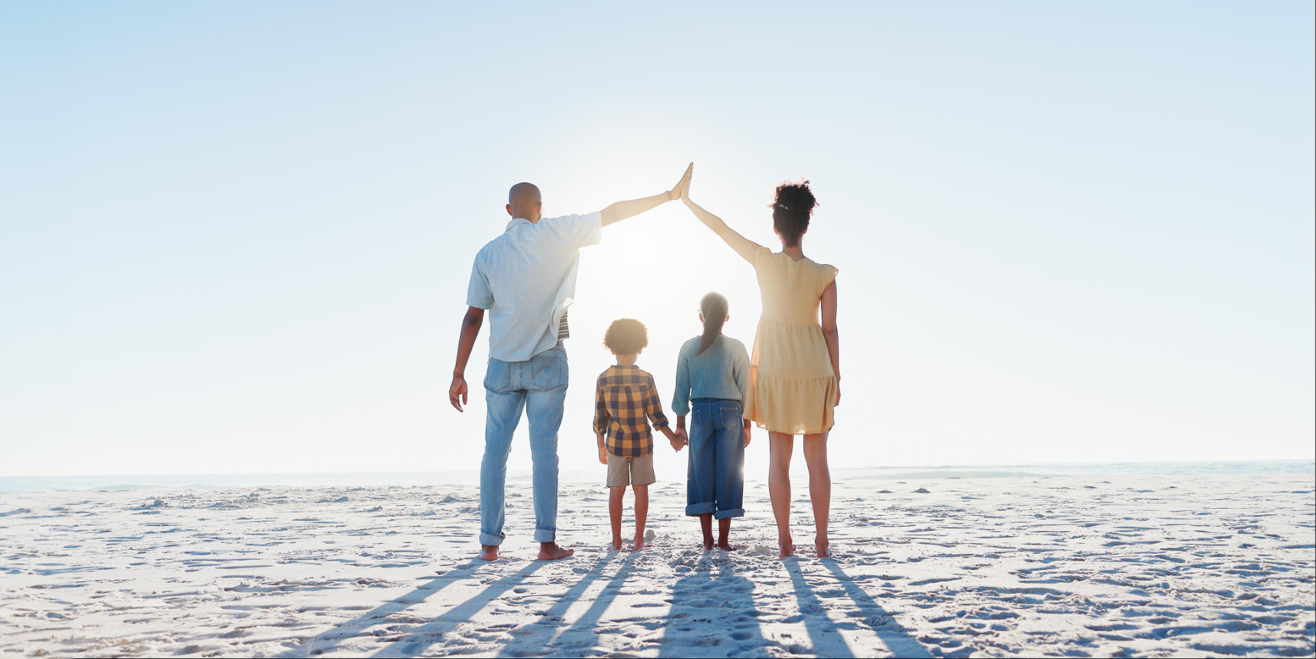 Back, high five or insurance with a family on the beach together